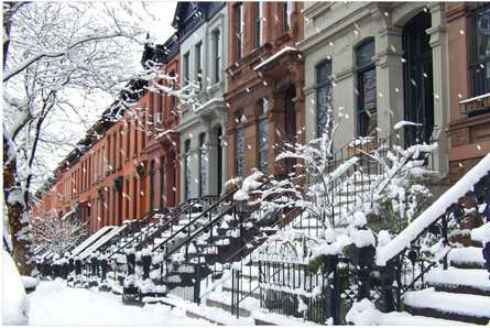 Traditional winter brownstone housing in New York City